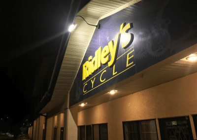 image of an LED exterior light installed by Exquisite Electric at Ridley's Cycle in Okotoks