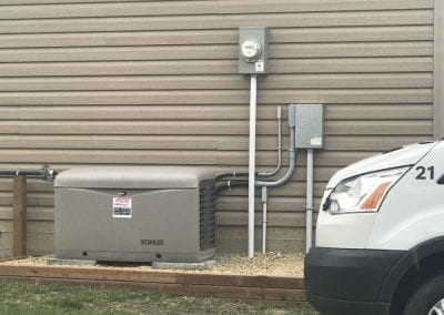 image of a 20kW Kohler generator installed outside a rural alberta residence